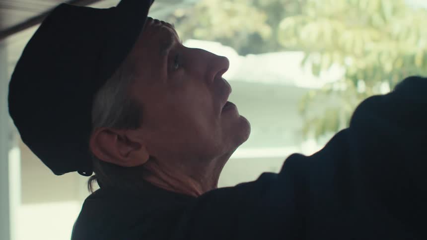 A clip of a man taking a measurement