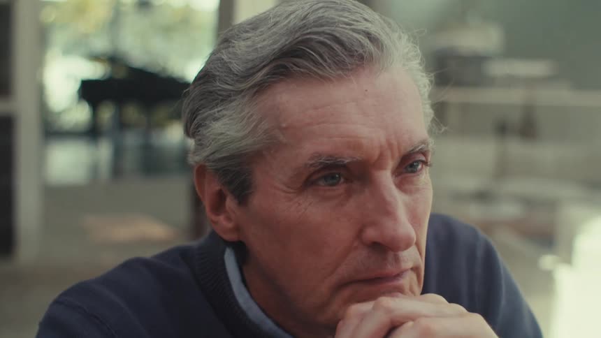 A clip of a man contemplating his response