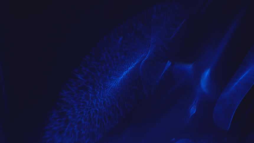 Various blue abstract shapes expanding in an environment that is black
