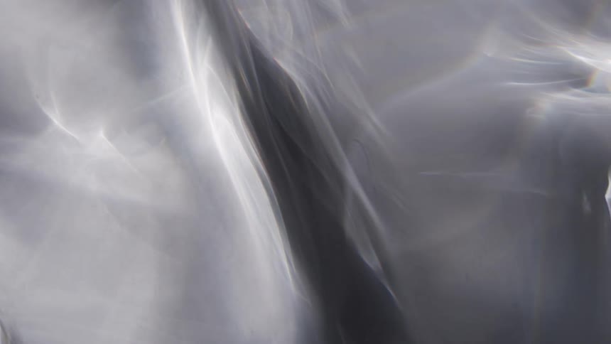 Close up of a shiny gray abstract object