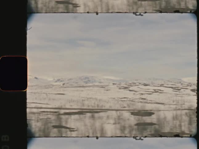 The fields are covered in snow on the countryside