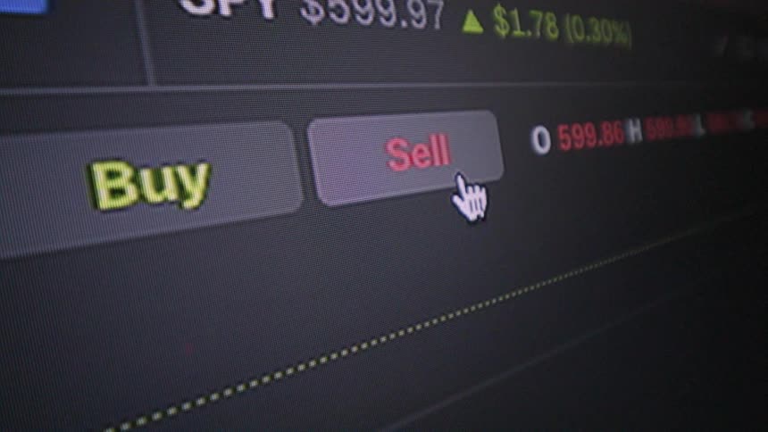 A mouse pointer on a dark screen with some white ceilings and then a button with red writing is clicked