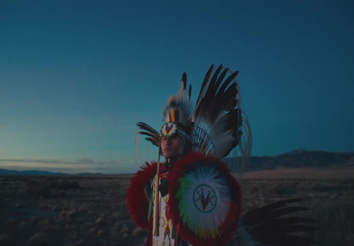 A clip of a person in a traditional costume