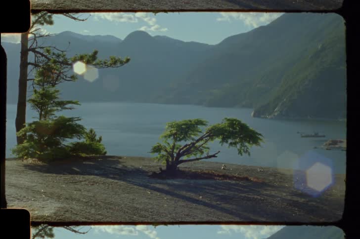 Sea landscape with green mountains in the background