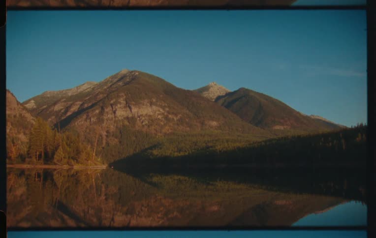 A clip of a mountainous arear close to the shore