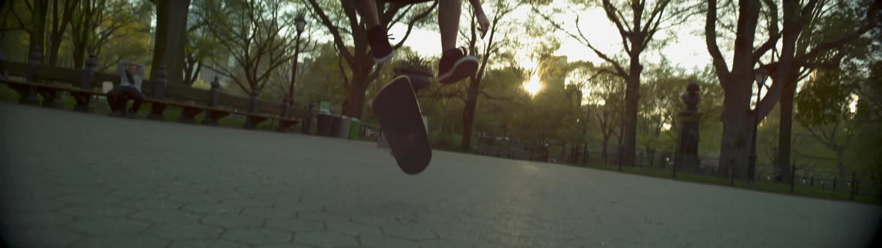A man does a jump on a skateboard