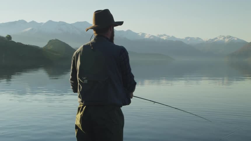 Man fly fishing in a lake