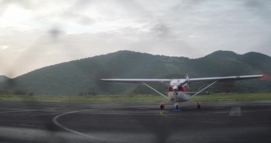A clip of a plane in an airfield
