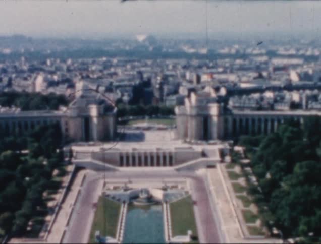 A distant cityscape with grand buildings and sprawling urban scenery