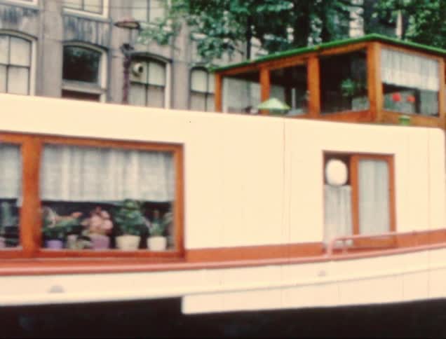 Boat on a canal in a classic city