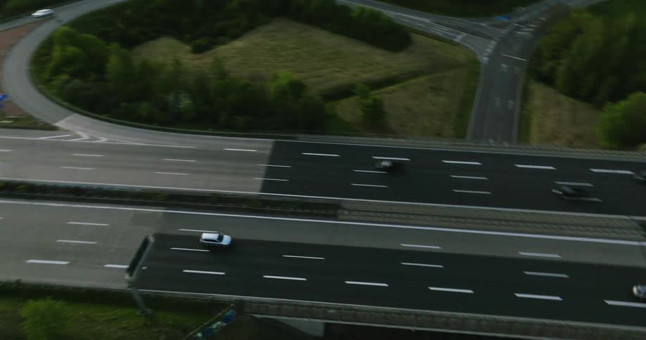 Cars drive down a highway