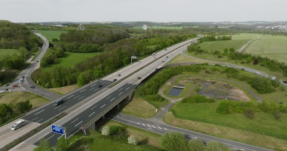 Cars drive along a highway