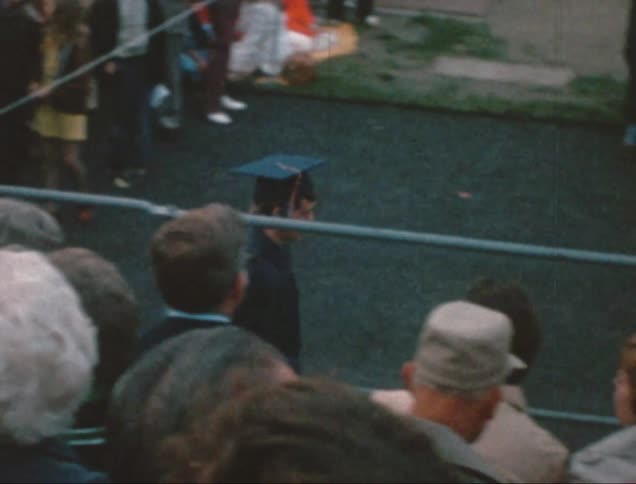 A clip of a graduands walking to the city