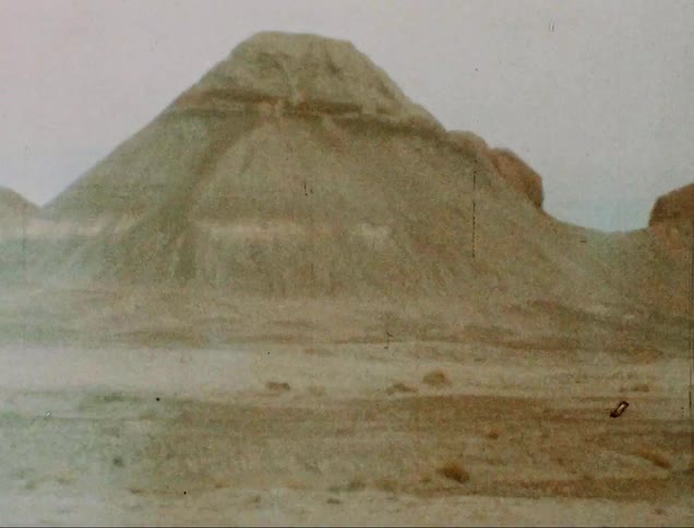 Camera pans left on rock formations