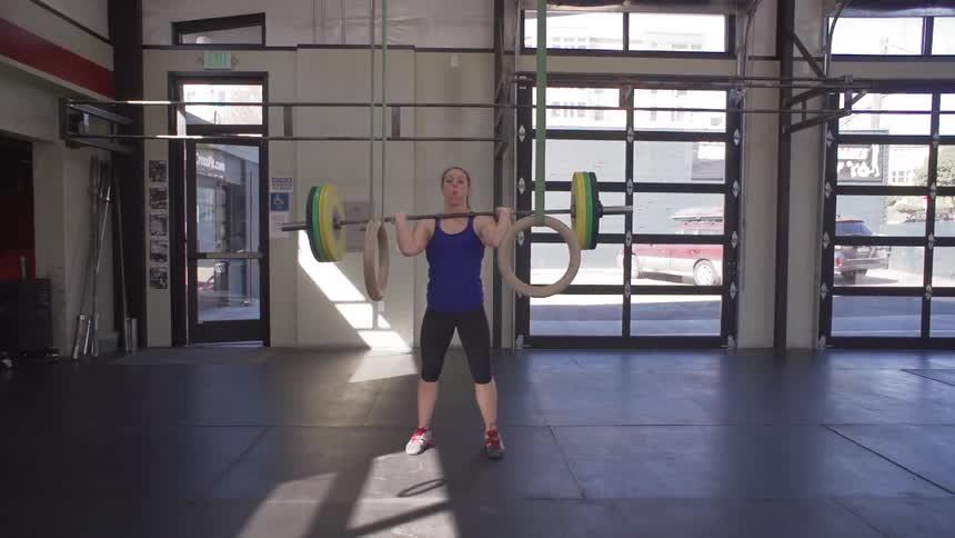 Woman clean and jerk powerlifting