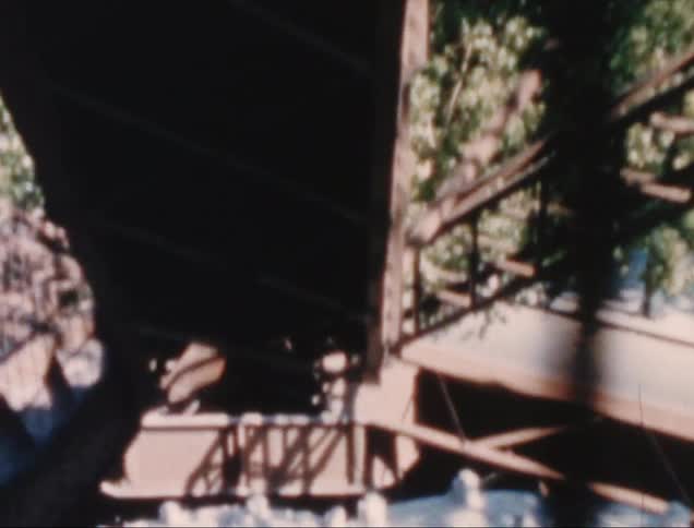 A clip of a rollercoaster in a park