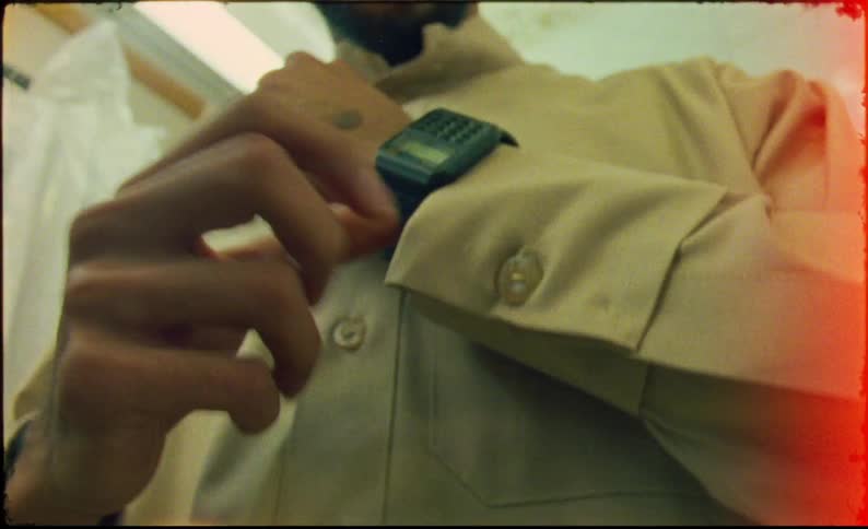 A clip of a male dressing up