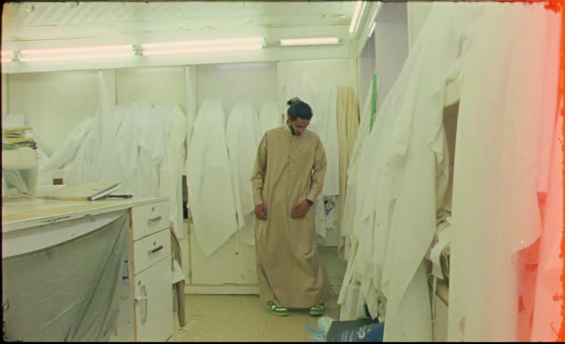 A man walks through the clothing store