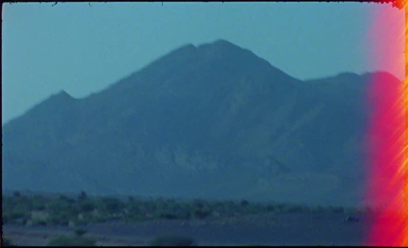 Driving past a mountain