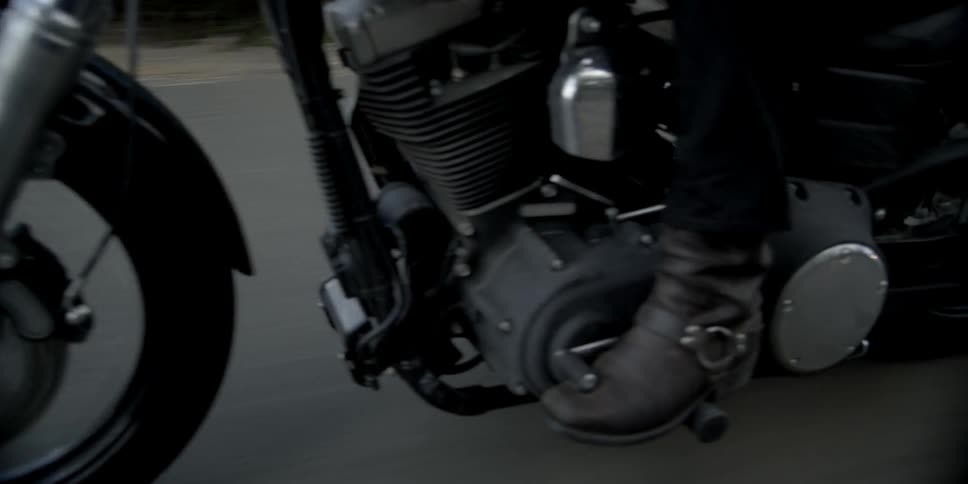 Motorcyclist cruising down the road