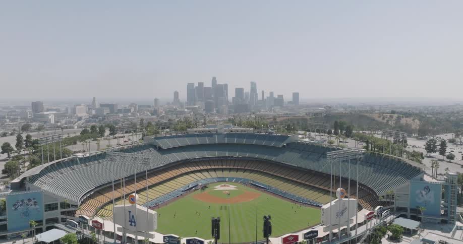 An aerial view of dodger stadium in los angeles with the baseball field and surrounding stands visible