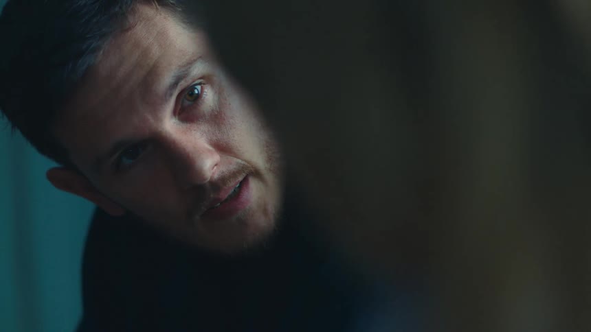 Portrait of a man talking to a woman