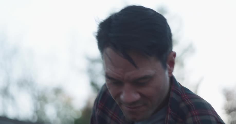 Portrait of a man in an outdoor area making an effort