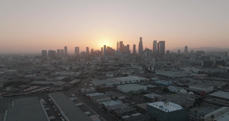 Silhouette of a cityscape at sunset in metropolitan area