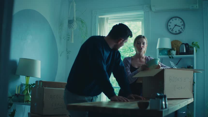 A clip of a male and a female having a conversation indoor