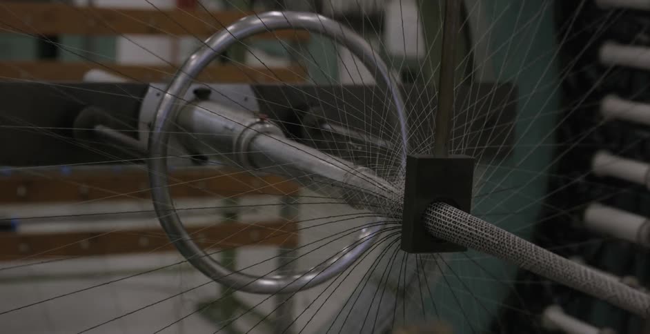 A weaving fabric machine rotates