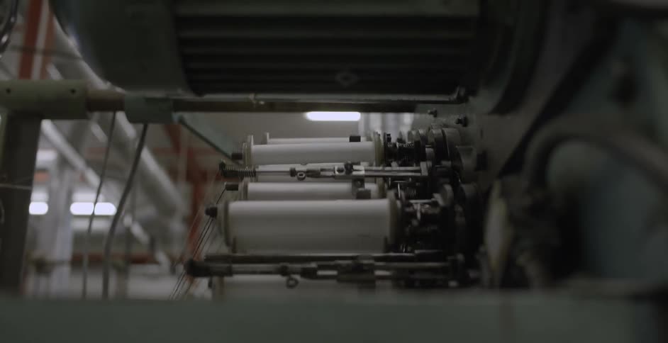 An industrial sewing machine in action