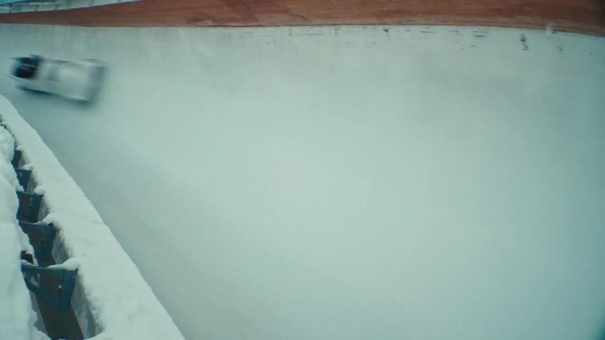Sports sled passing on an olympic ice rink