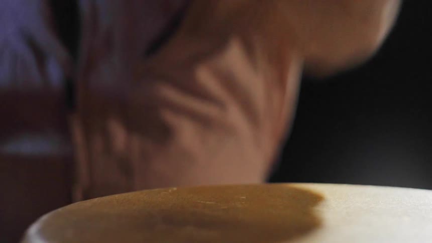 Pair of hands of a man playing drums