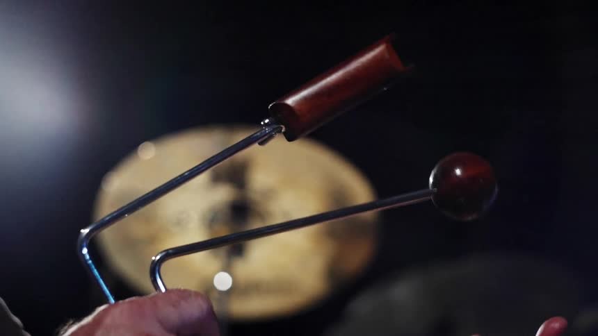 A clip of a person playing a musical instrument