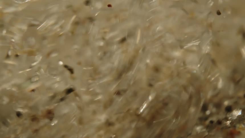 Abstract closeup of moving water with mineral salts