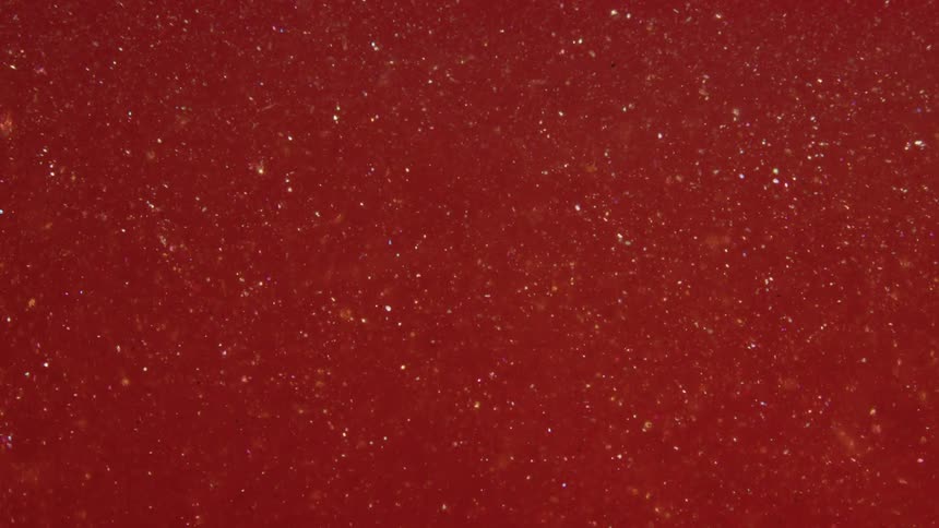 A clip a red floating shinning liquid