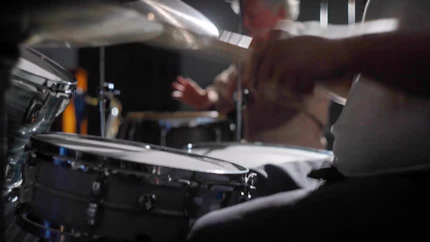 A close up clip of drummers