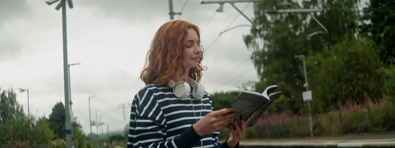 A woman reads a book
