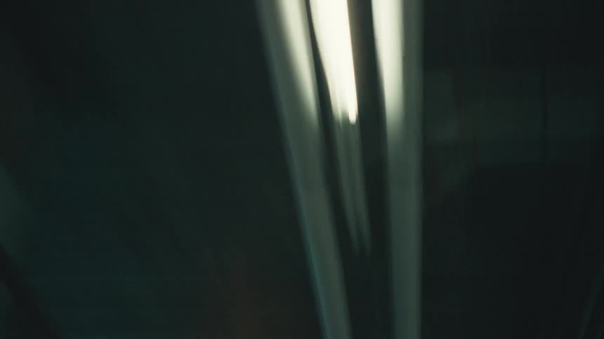 Upward view of a ceiling with lights on
