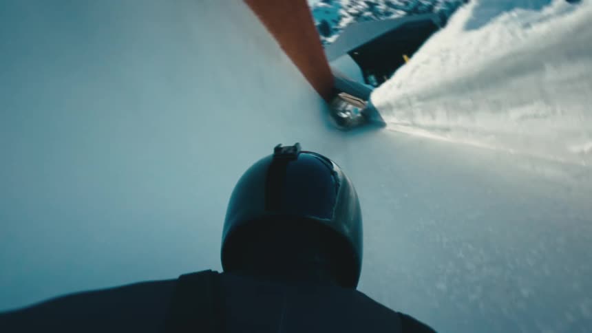 Point of view of a person performing on an ice rink in the sport of skeleton