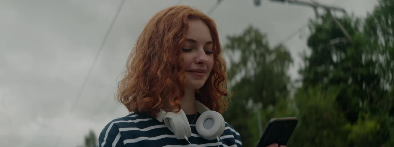 A close up clip of a lady operating a smartphone