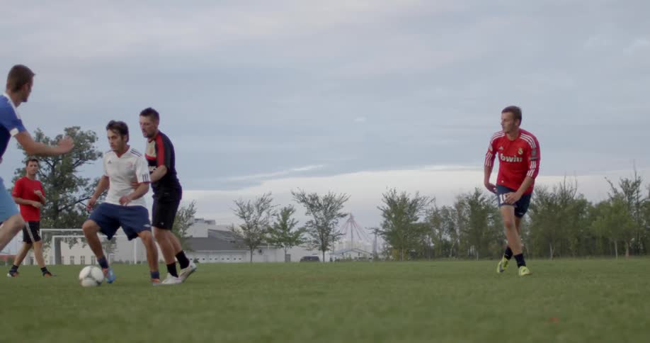 Soccer players are playing a game