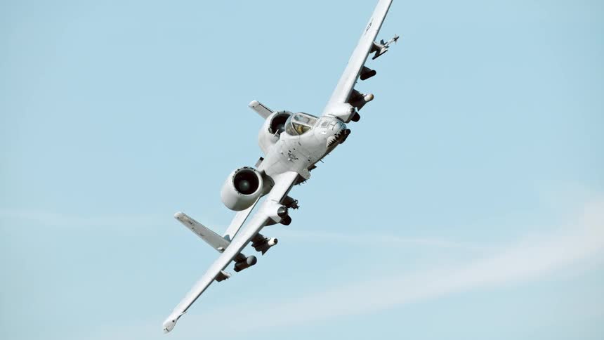 Military fighter jet flying into the sky