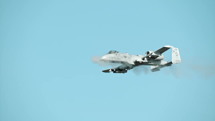 A jet flies through the sky