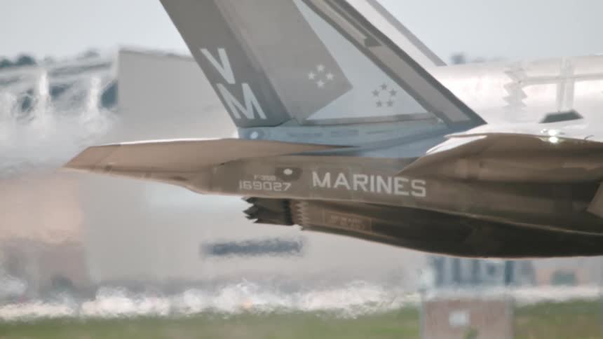 The back half of a marine airplane moves in slow motion