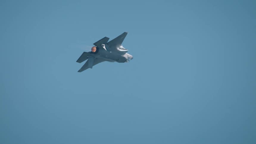 A jet is fling straight up in the air