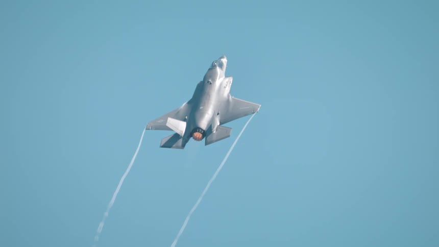 Jet taking off into the blue sky