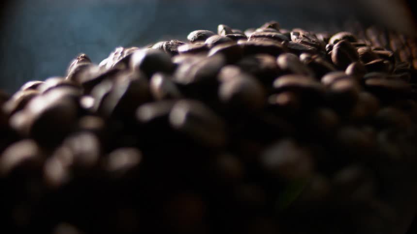 Pile of coffee grounds moving in slow motion