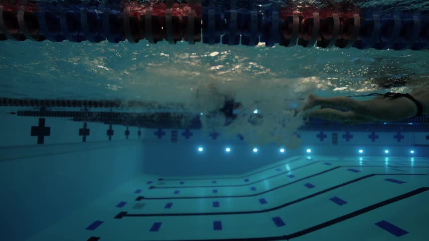 Woman swimming in a pool
