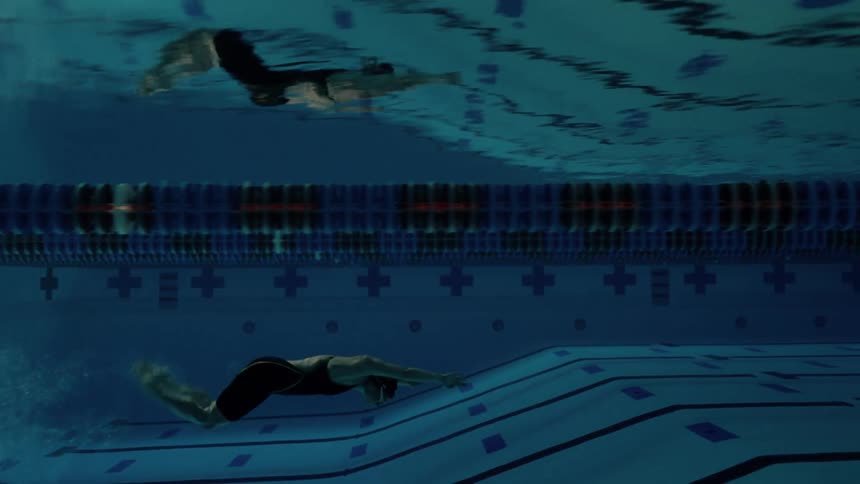 A clip of a person swimming inside the pool